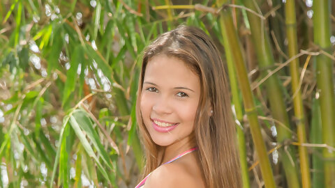 Sweet little Kiara Lorens happily shows...