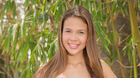 Sweet little Kiara Lorens happily shows...